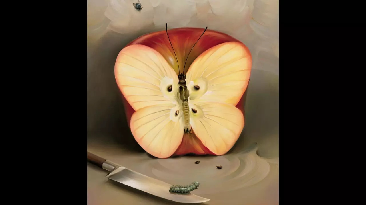 A butterfly camouflages on a half-cut apple in this optical illusion | Courtesy: The Minds Journal