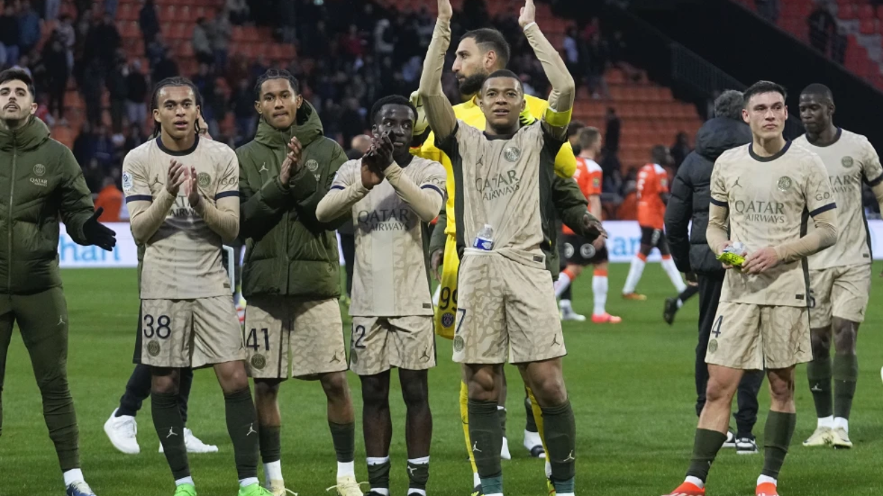 PSG players celebrate after the match between Lorient and Paris Saint-Germain 