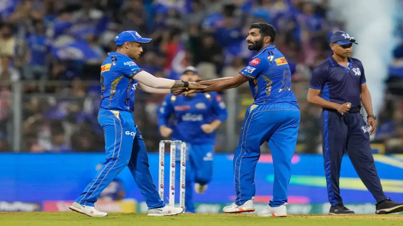 Jasprit Bumrah celebrates a wicket with Suryakumar Yadav