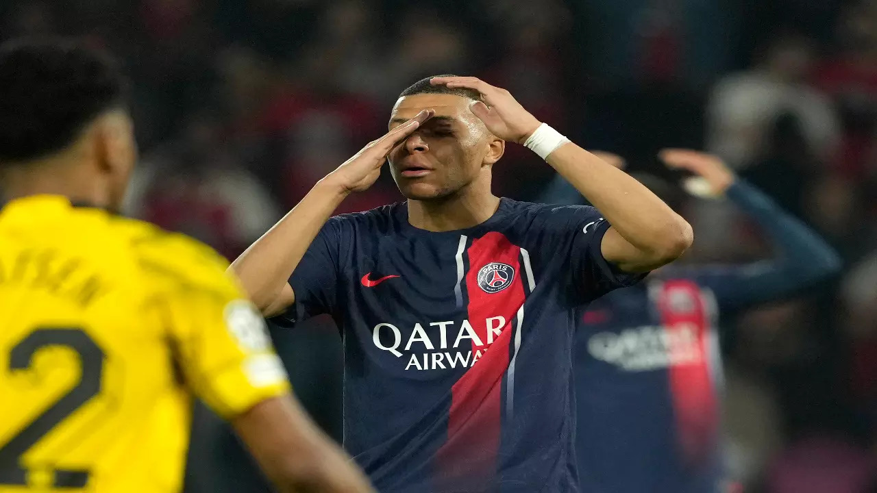 Kylian Mbappe reacts after PSG's loss to Borussia Dortmund in the Champions League