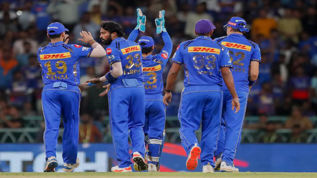 Mumbai Indians players celebrating a wicket