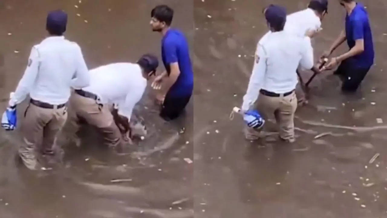 Pune Traffic Cops Brave Heavy Rains, 'Unsung Heros' Work Tirelessly to Unclog Waterlogged Roads | WATCH