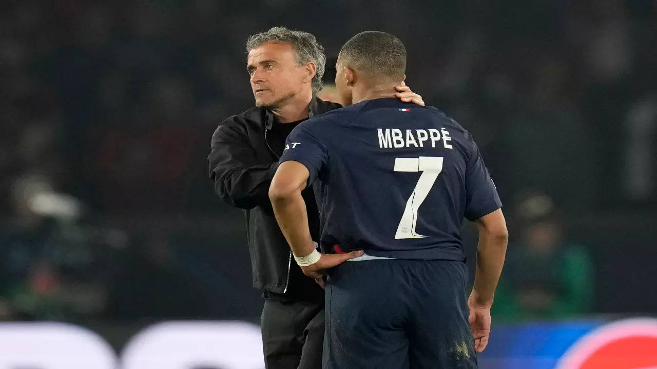 PSG manager Luis Enrique consoles Kylian Mbappe