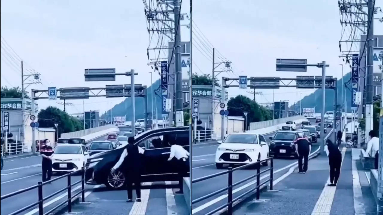 A Japanese establishment's staff facilitates a patron's parking exit. | Credit: Massimo/X