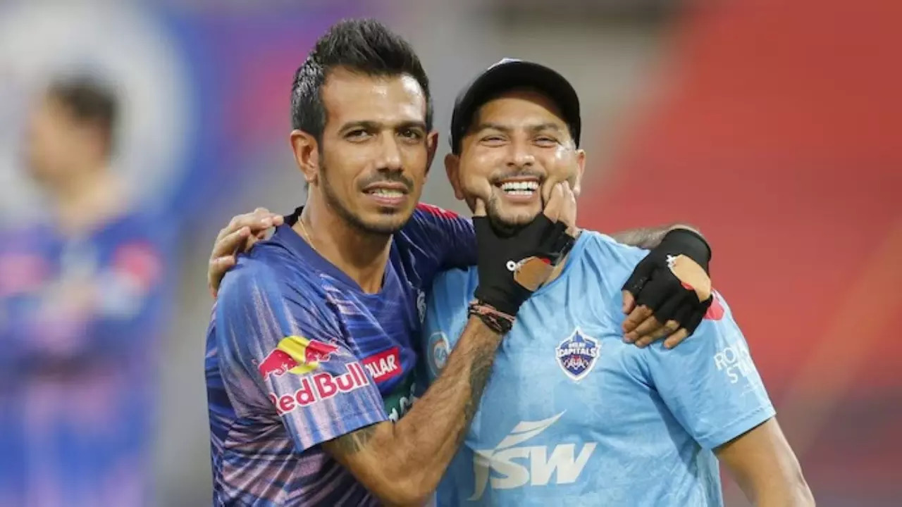 Yuzvendra Chahal shares a light moment with Kuldeep Yadav