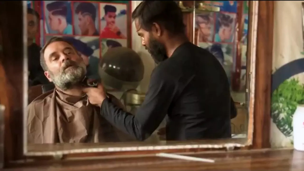 Rahul Gandhi gets a haircut at a local salon in Raebareli, Uttar Pradesh.  | Courtesy: @INCIndia/X