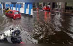Hyderabad Weather Rainfall Causes Waterlogging Traffic Jams See Pics