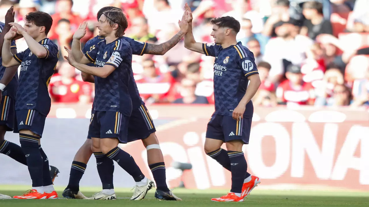 Real Madrid players celebrating a goal