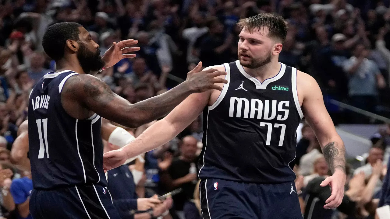 Kyrie Irving and Luka Doncic in action