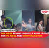 Shah Rukh Khan seen hiding behind umbrella leaving for IPL Final after hospital discharge