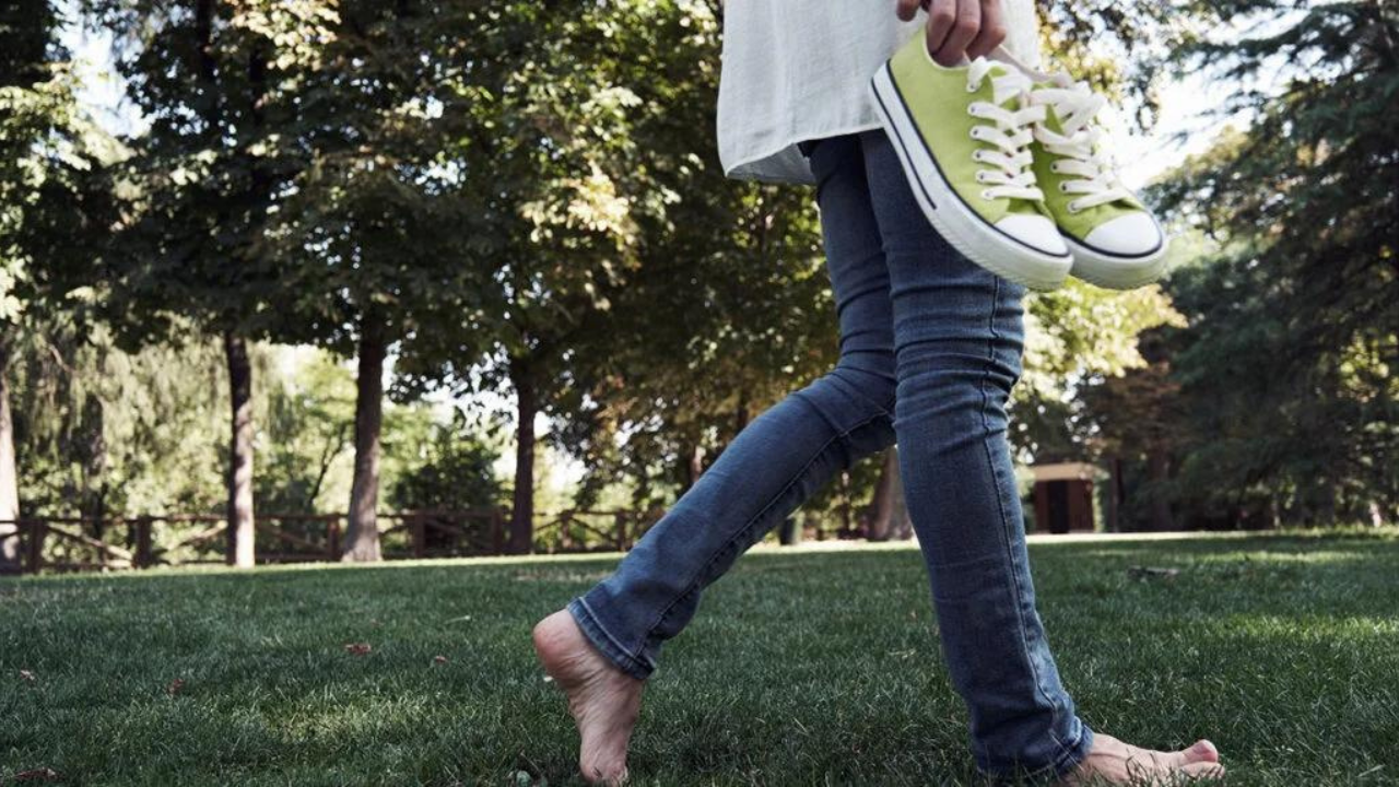 surprising benefits of walking barefoot on grass