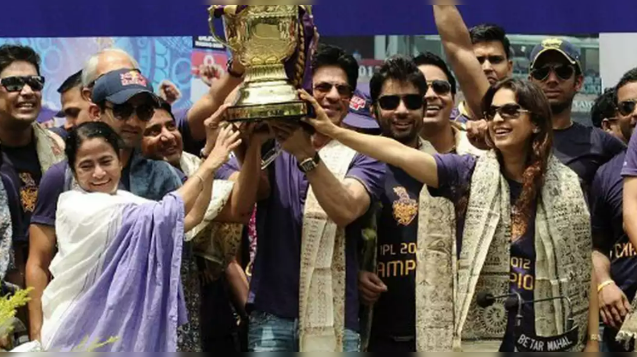 West Bengal chief minister, Mamata Banerjee lifts the trophy with the co-owners of KKR in 2012 (File Photo)