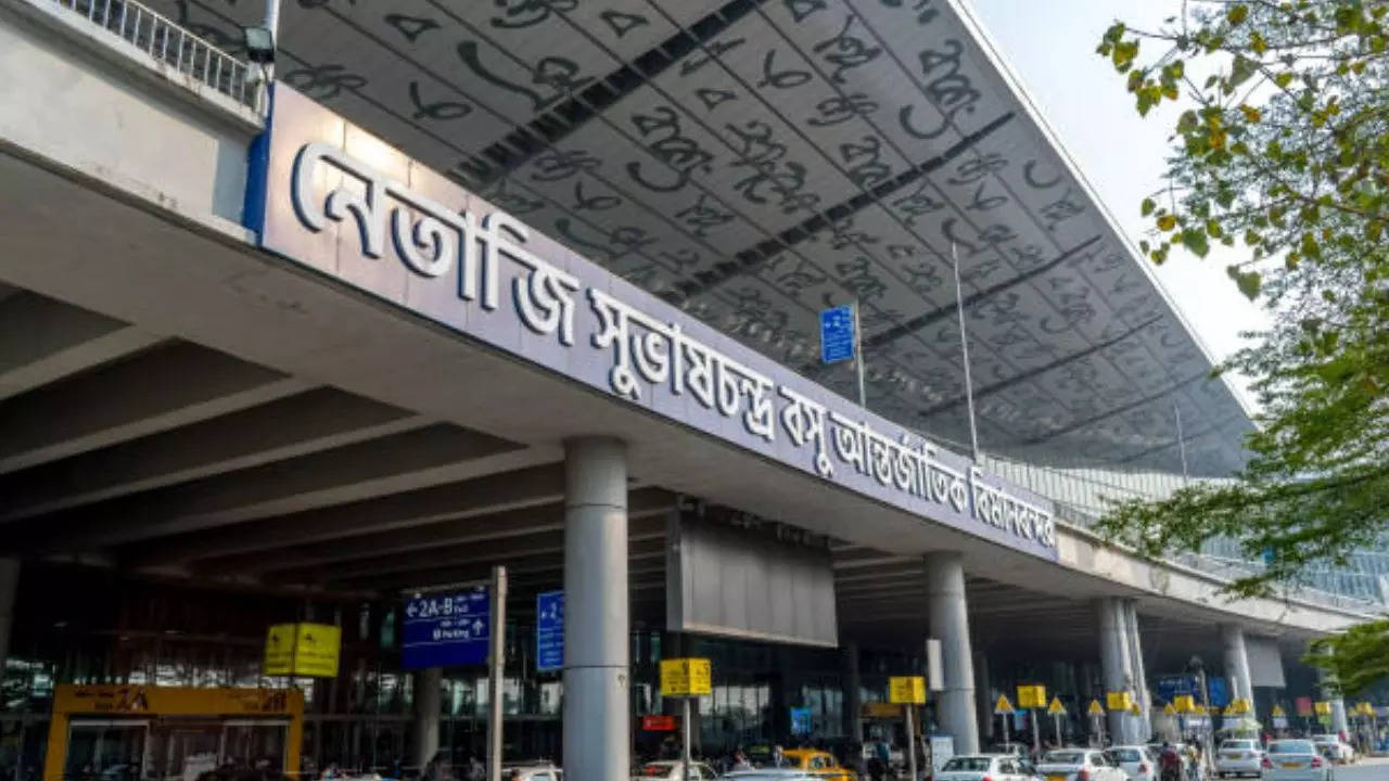 kolkata airport news :  netaji subhas chandra bose international airport resumes flight operations after 21-hour closure amid cyclone's rainy aftermath