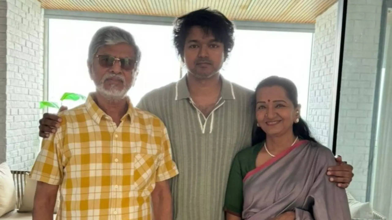 Vijay with his parents