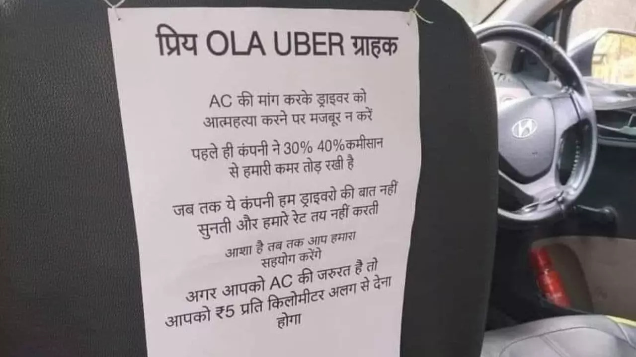 A note asks Ola and Uber passengers to pay ₹5/km extra for AC rides. | @divya_gandotra/X