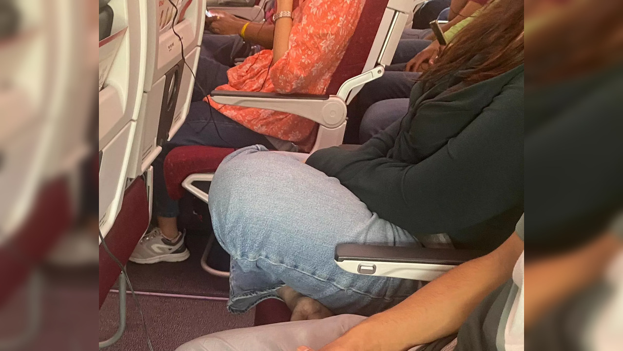 A passenger pictured on an Air India flight that departed from Bengaluru. | @BLRAviation/X
