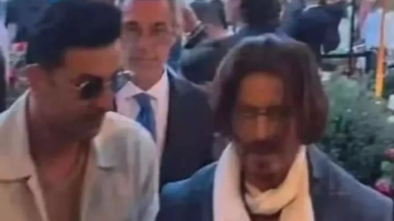 Shah Rukh Khan sports a Johnny Depp-like hairstyle at the Ambani pre-wedding bash. | @SRKUniverse/X