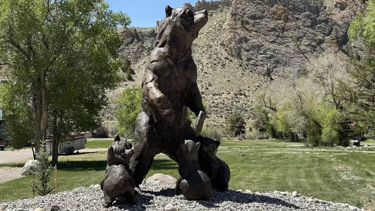 The sculpture depicts the moment Grizzly 399 emerged from hibernation with four new cubs. | Andrew Rossi