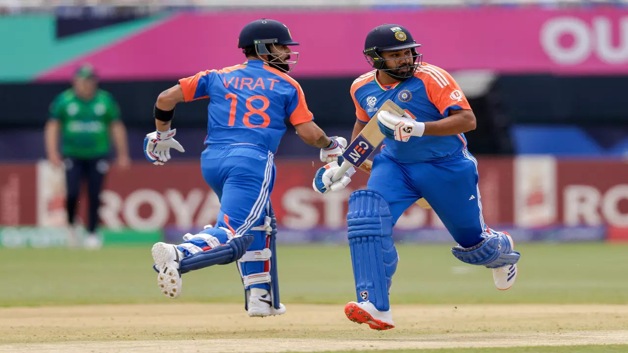 Virat Kohli and Rohit Sharma in action