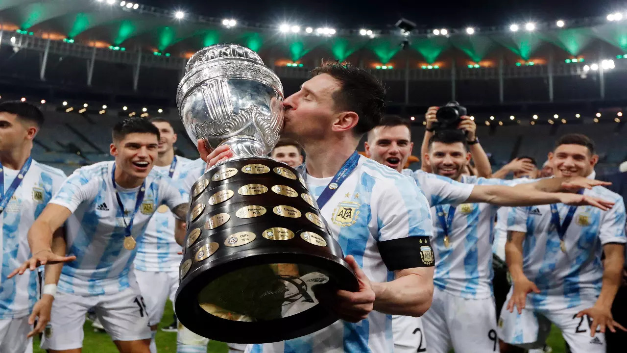 Lionel Messi with the Copa America trophy