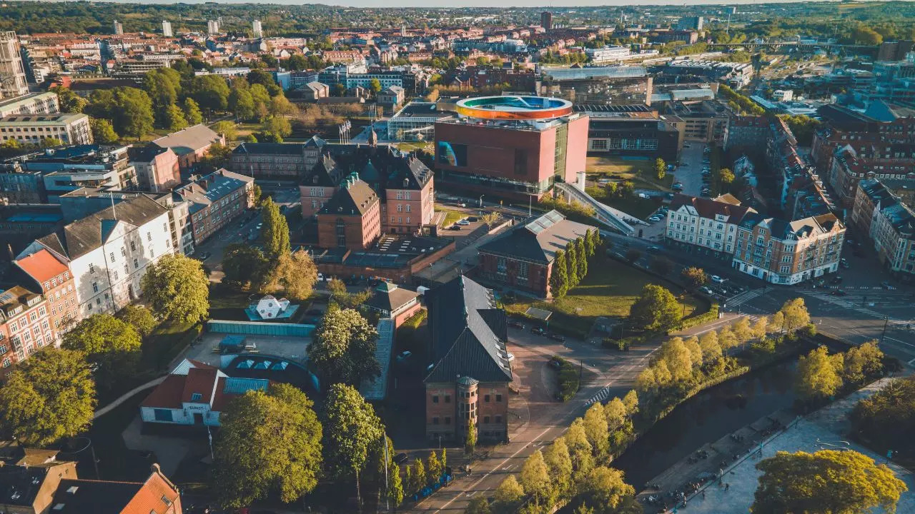 Aarhus, Denmark is now the happiest city in the world. Credit: Canva