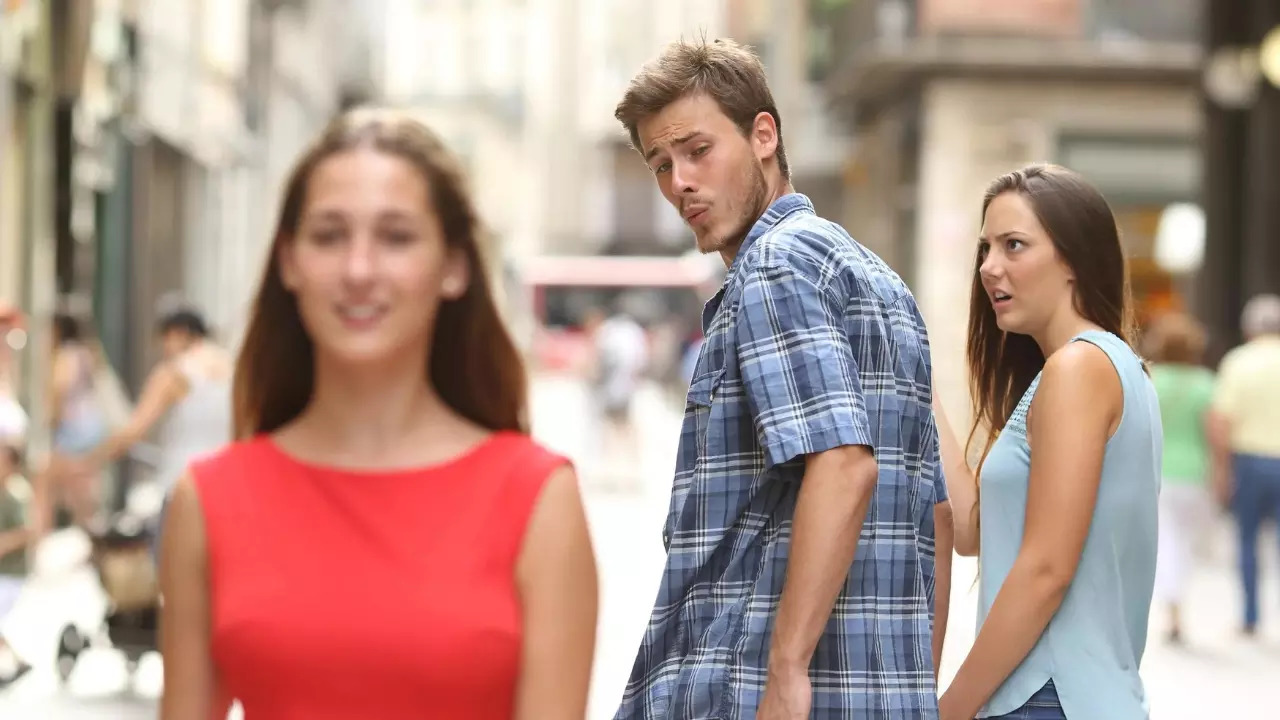 Distracted Boyfriend is one of the first memes to be converted by Dream Machine. | Shutterstock