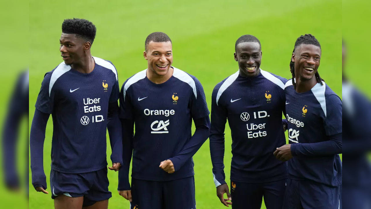 Kylian Mbappe with his fellow French players during a practice session