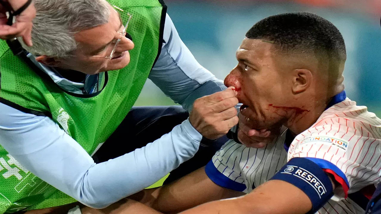 Kylian Mbappe is treated by French medical staff