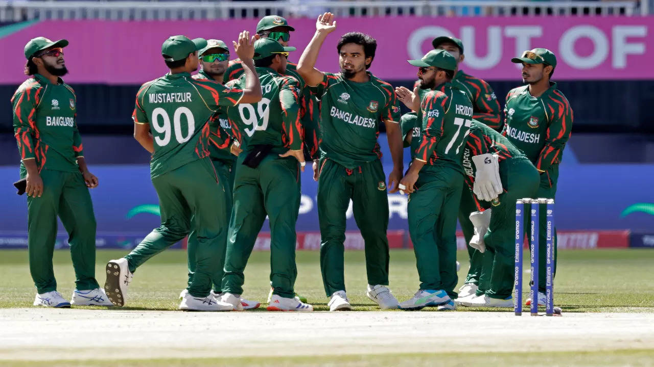 Bangladesh players celebrate a wicket