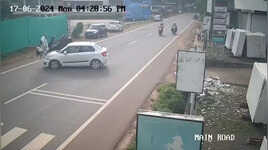 CCTV Footage Bike-Riding Couple Sent Flying After Crashing Into U-Turning Car