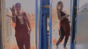 Watch Womans Dangerous Dance on Moving Trains Door Edge Sparks Outrage