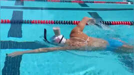 When 7-Time Olympic Gold Medalist Katie Ledecky Balanced Chocolate Milk on Her Head While Swimming