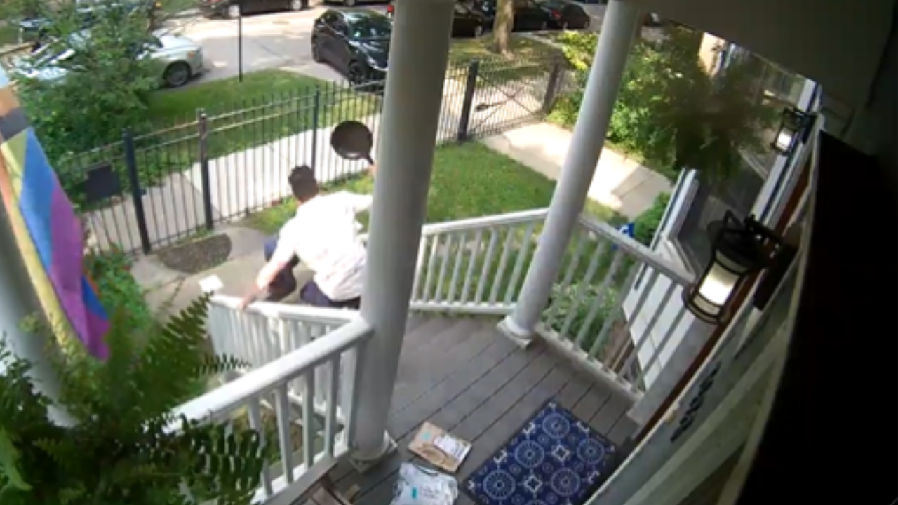 chicago man uses frying pan to chase burglar; cctv footage goes viral
