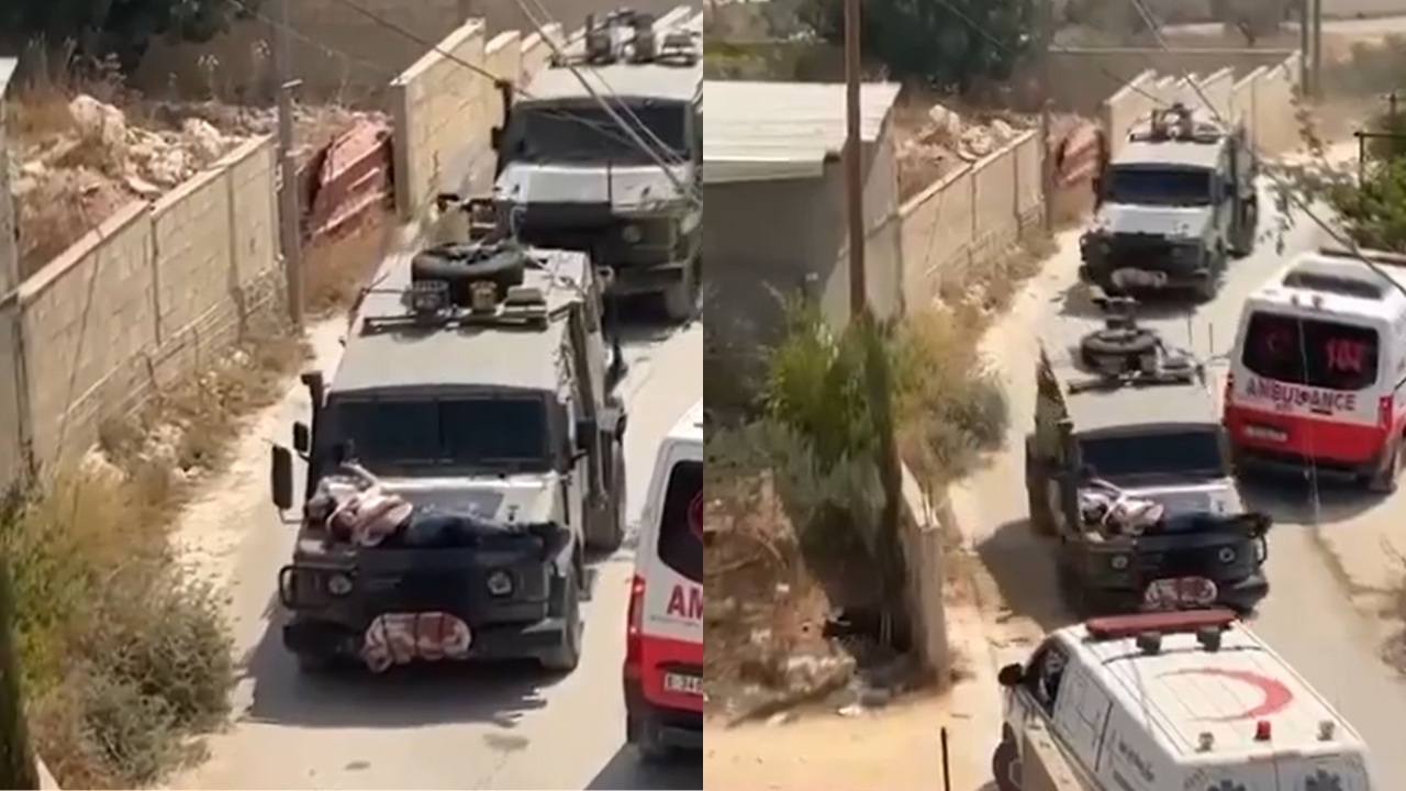 VIDEO | Wounded ​Palestinian 'Suspect' Strapped To Israeli Military Jeep