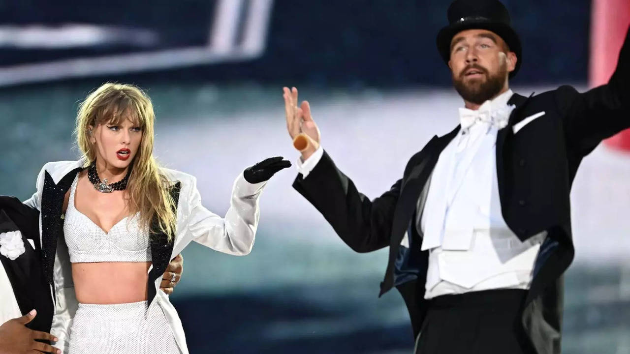 Fans Go Gaga As Taylor Swift's Boyfriend Travis Kelce Makes Surprise Appearance Onstage