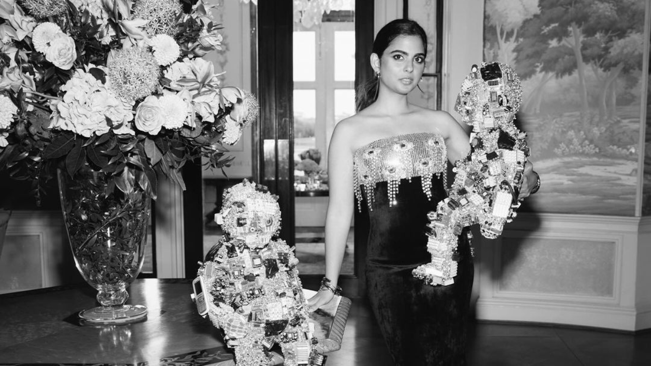 Isha Ambani carrying a couture piece