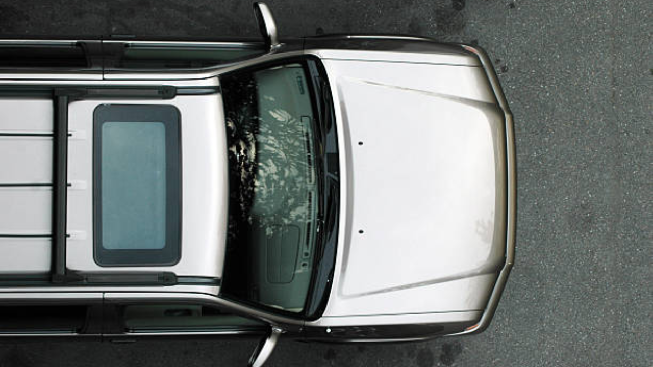 bengaluru man fined, booked for allowing his kids to pop out of sunroof of moving car