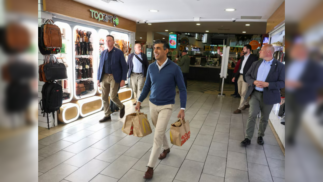 British Prime Minister Rishi Sunak collects McDonald's on the day of a Conservative general election campaign