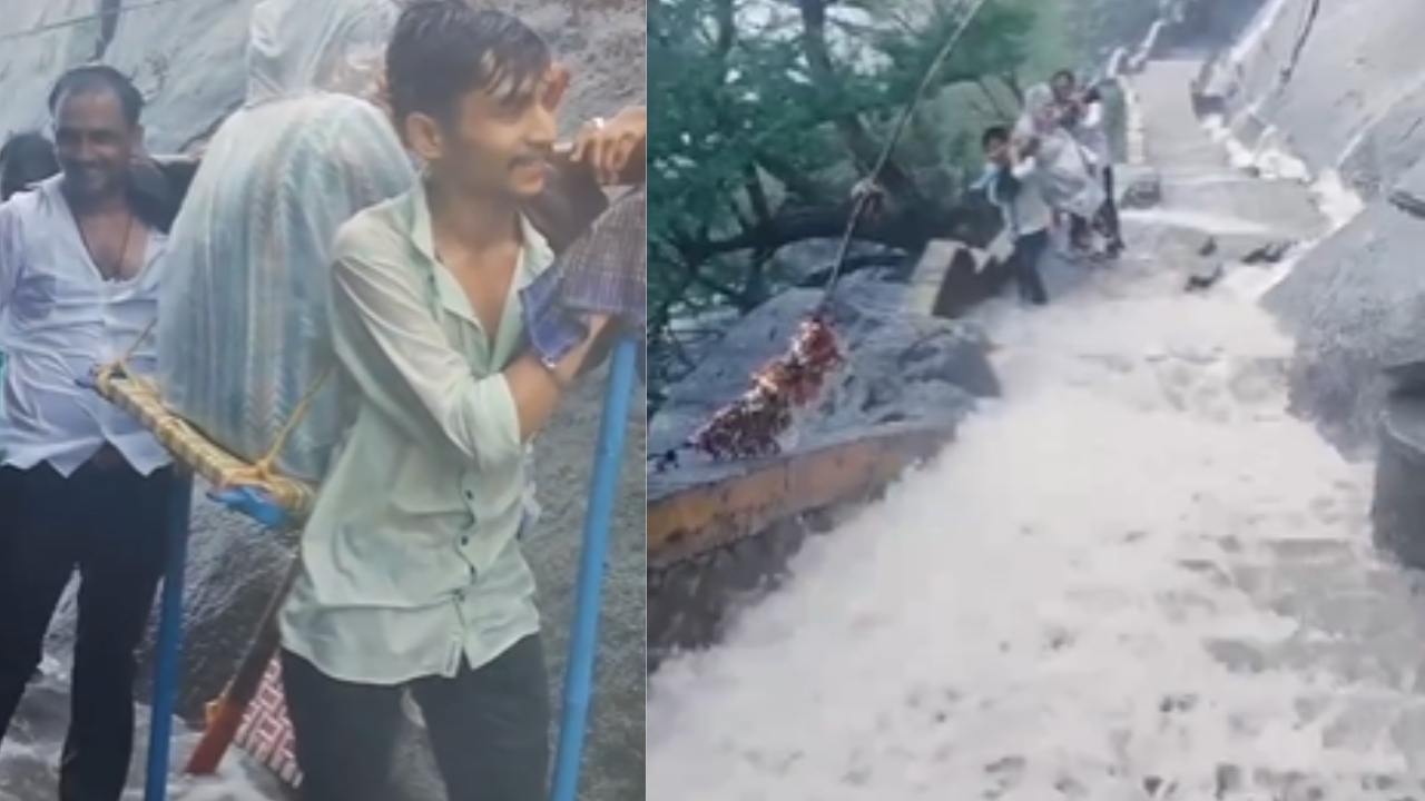 Devotees Carried in Palkis Amid Heavy Gujarat Rain at 3672 ft Girnar Mountain