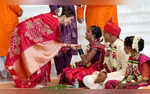 Nita Ambani Keeps It Classic In A Red Sari With Gayatri Mantra Embroidered On The Pallu