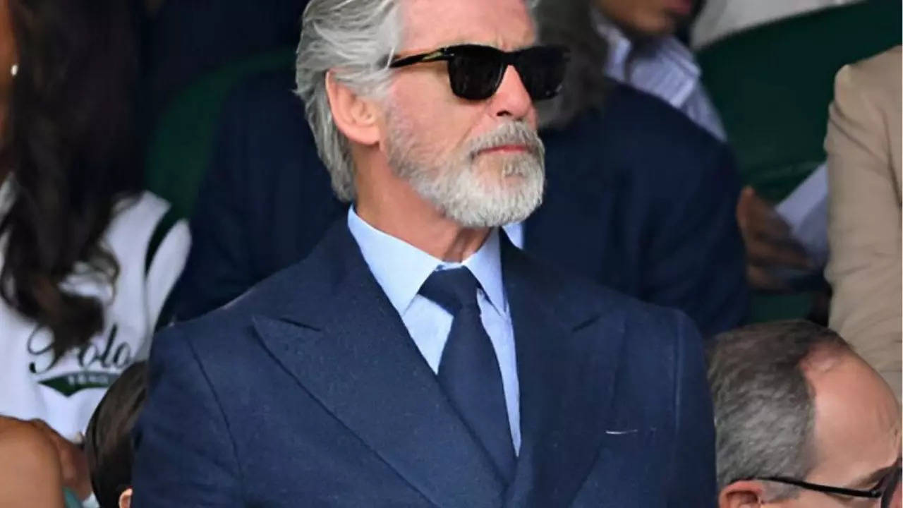 Amitabh Bachchan's Suit Style Praised by Canadian Expert in Pierce Brosnan Comparison, Thrilling Indian Fans