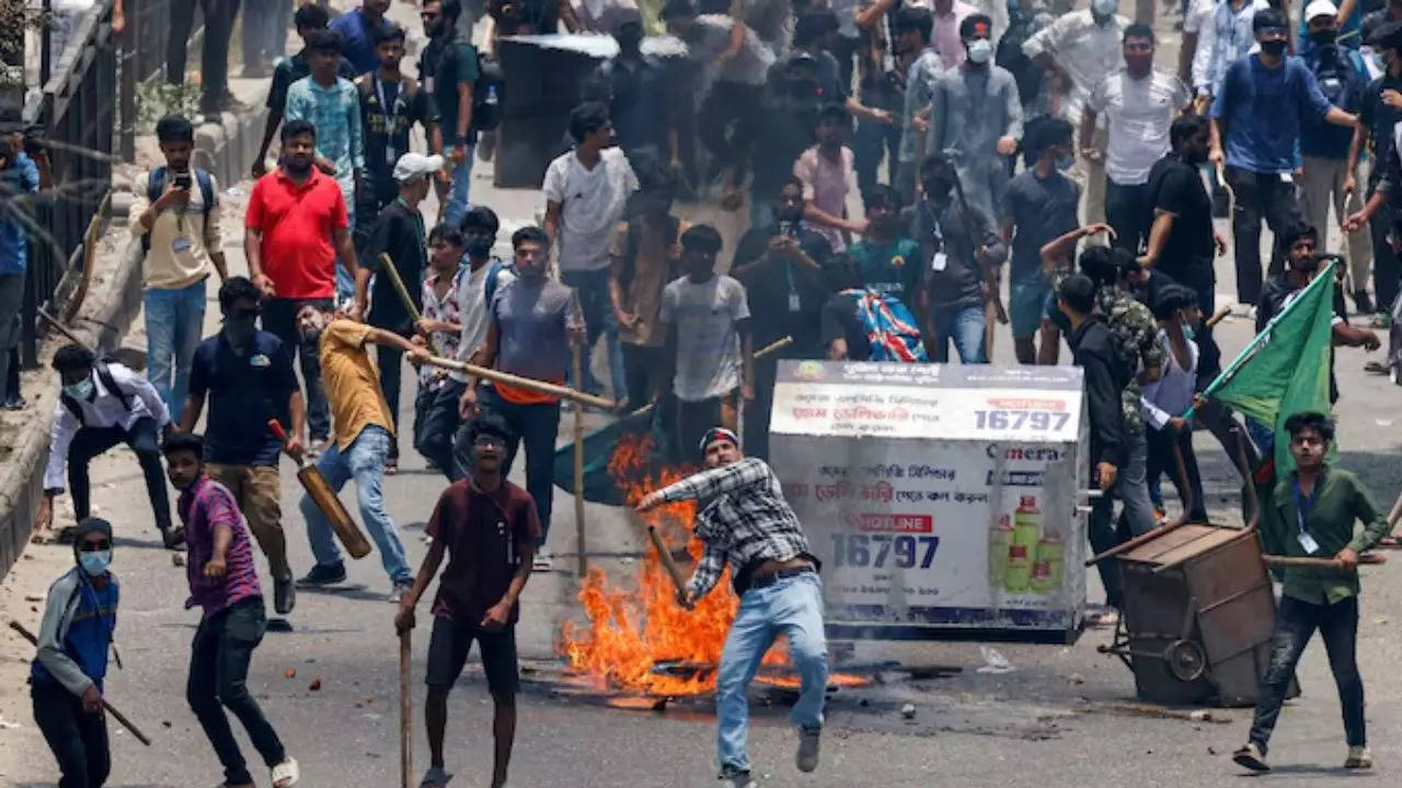 Anti-quota supporters clash with police and Awami League supporters in Dhaka