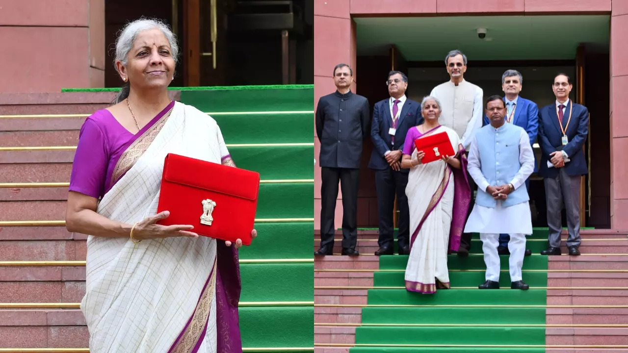 Finance Minnister Nirmala Sitharaman with the customary 'bahi-khata' in a white-magenta saree. | AP