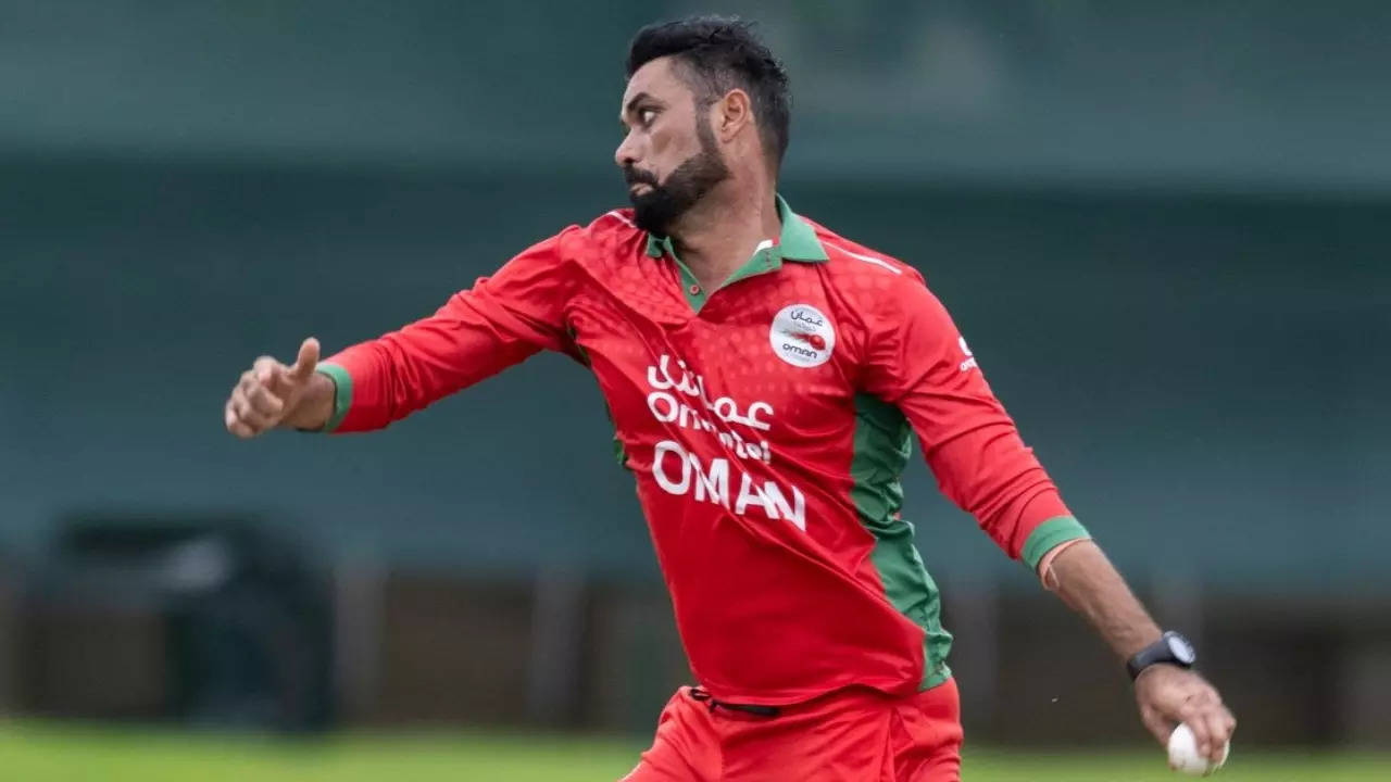 Oman pacer Bilal Khan in action