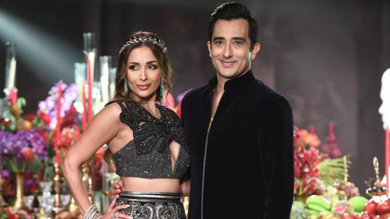 Malaika Arora and Rahul Khanna walked the ramp for Siddartha Tytler. Credit: Manoj Kesharwani