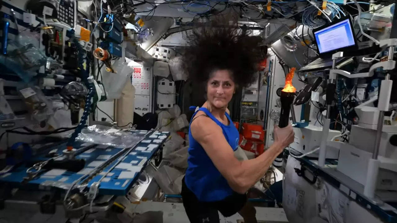 Sunita Williams passes the torch to space station astronauts in mock Olympics. | NASA