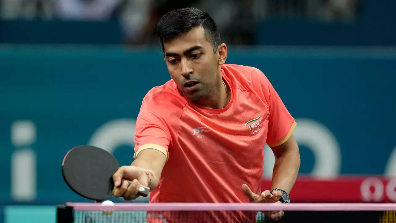 Indian table tennis player Harmeet Desai in action at Paris Olympics