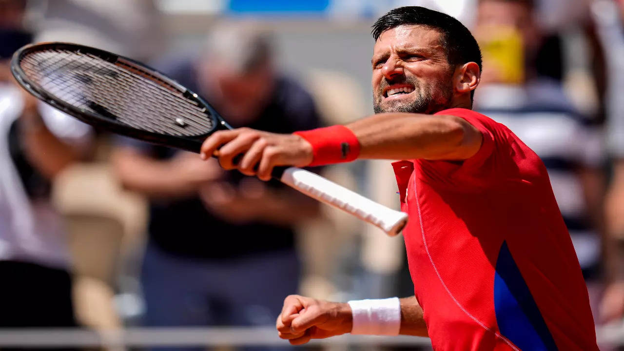 Novak Djokovic celebrates his win at Paris Olympics