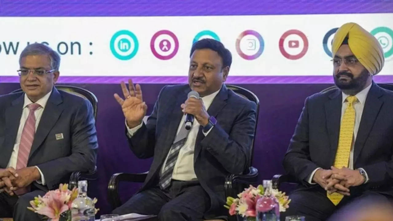 Chief Election Commissioner Rajiv Kumar with Election Commissioners Gyanesh Kumar and Sukhbir Singh Sandhu