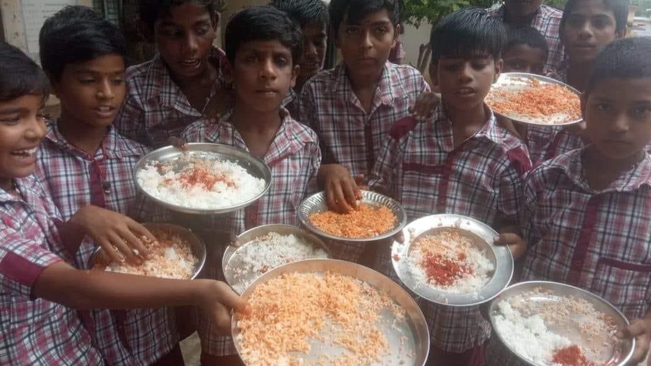 School students with chilli powder and rice